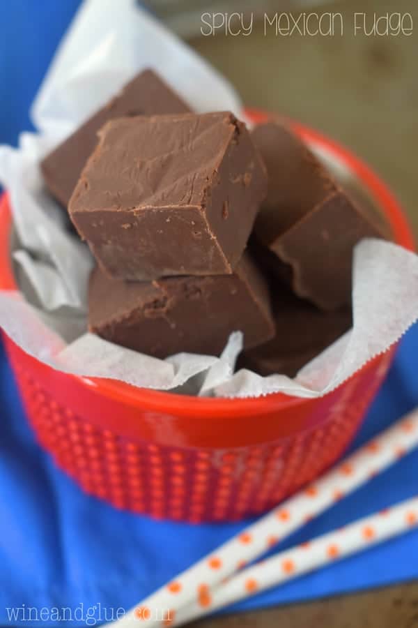 a small red bowl full of pieces of spicy Mexican fudge