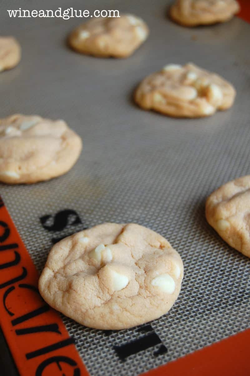 a cinnamon roll cheesecake cookie on a reusable baking mat