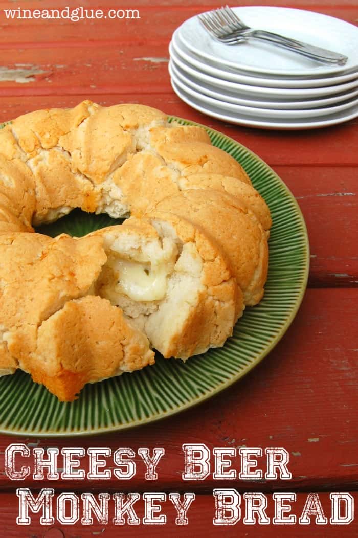 Cheesy Beer Monkey Bread combines the buttery rich flavor of beer bread with gooey, tangy cheese into Monkey Bread form. Easy to make and fun to eat!