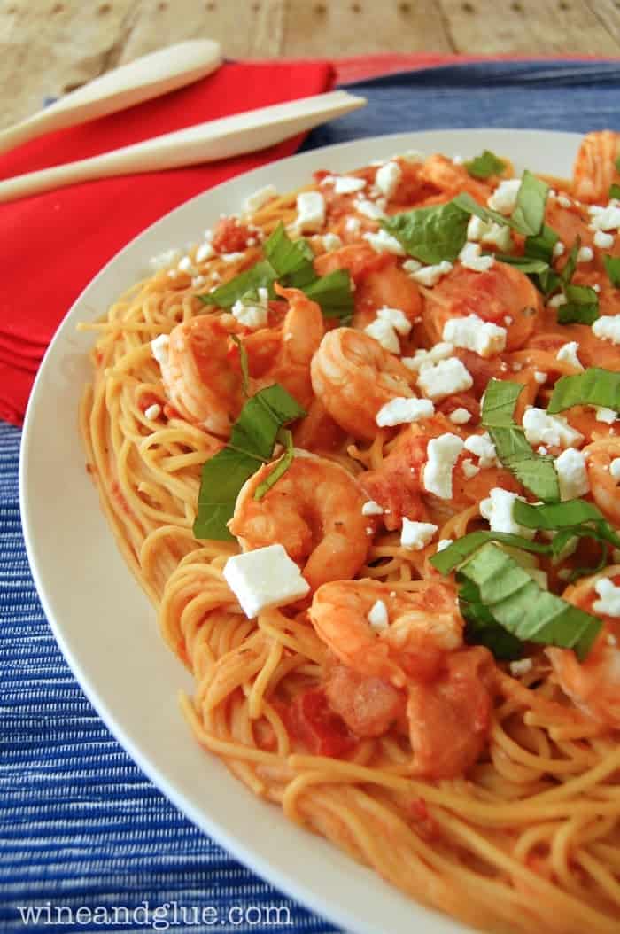 Creamy Tomato Pasta and Shrimp  |  A delicious, creamy, and rich dish that will feed a crowd! via www.wineandglue.com