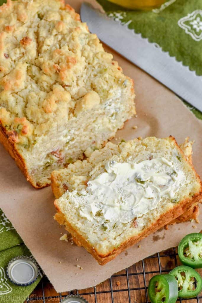 butter spread on a piece of jalapeno popper beer bread