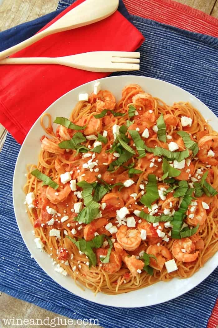 Creamy Tomato Pasta and Shrimp  |  A delicious, creamy, and rich dish that will feed a crowd! via www.wineandglue.com