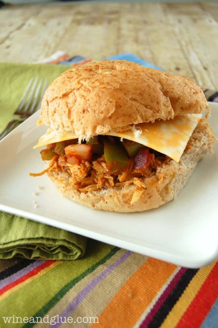 Slow Cooker Tex Mex Pulled Chicken Sammies! An easy meal delicious it will become a regular in your dinner rotation #kraftrecipemakers #shop via www.wineandglue.com