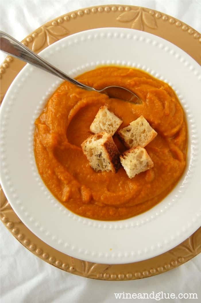 Pumpkin Curry Soup with home made Rosemary Croutons that is so warm and delicious!  Perfect for fall! via www.wineandglue.com
