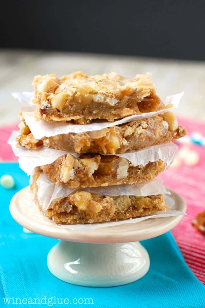 Cookie Butter Magic Bars!  Delicious, ooey gooey, and the amazing taste of cookie butter! via www.wineandglue.com