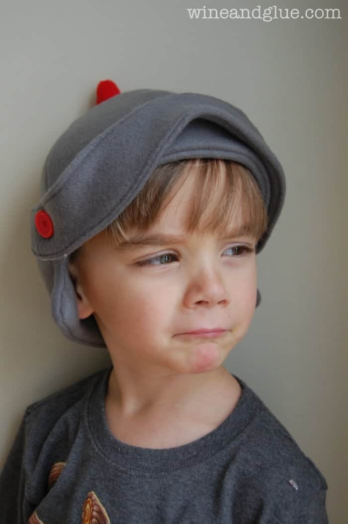 little boy in a fleece knight hat