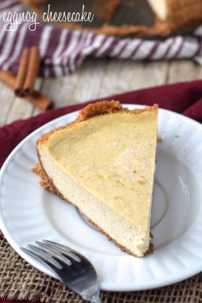 Eggnog Cheesecake is a delightful twist on a holiday favorite! Light, creamy cheesecake filling with warm cinnamon and nutmeg flavors of eggnog in a rich crust. 