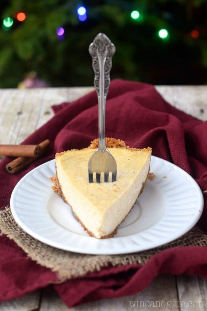 Delicious Eggnog Cheesecake with a perfect Cinnamon Graham Cracker Crust!