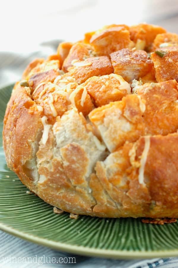 This Buffalo Pull Apart Bread is cheesy bread with that buffalo flavor that makes it perfect for any party!