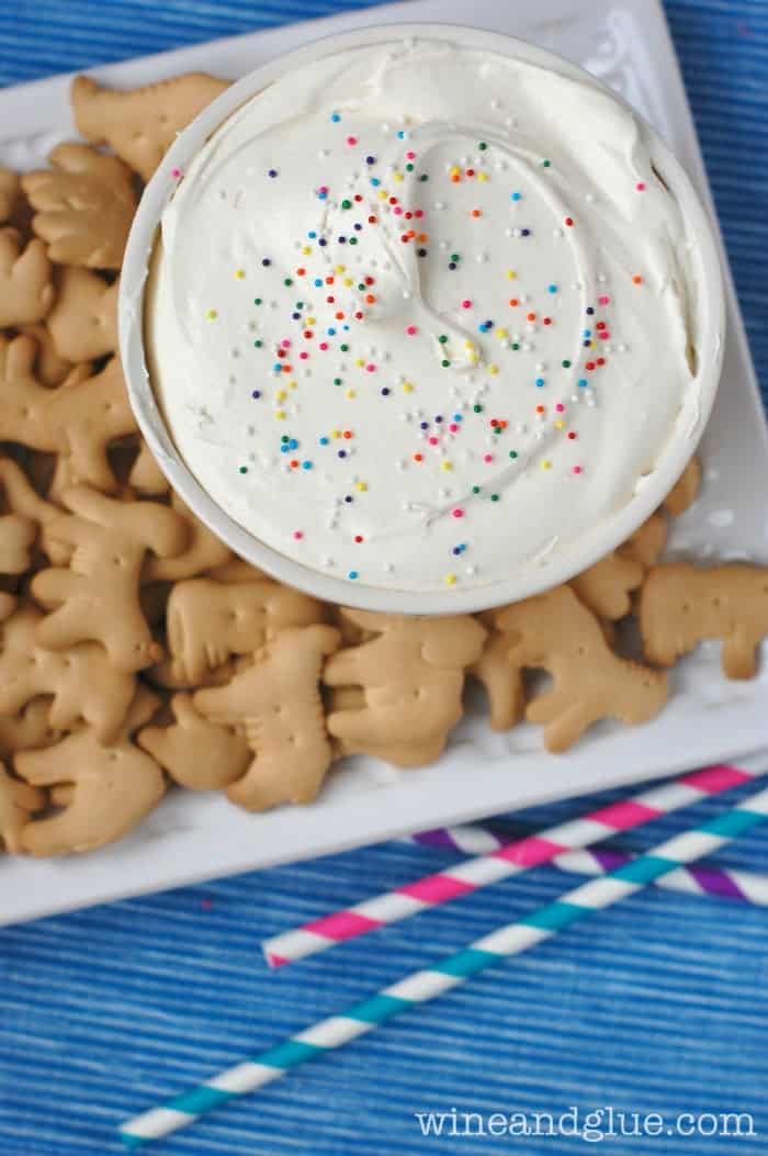 This Cheesecake Cake Batter Dip is a super easy dip that combines the awesome flavors of cheesecake and cake batter!