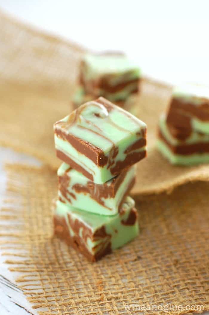 three pieces of mint chocolate fudge stacked on top of each other