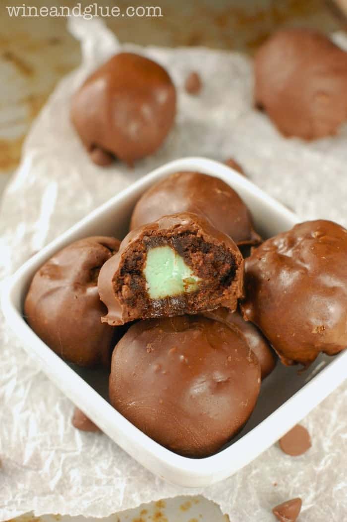 Mint Creme Brownie Bombs | www.wineandglue.com | Irresistible brownie truffles filled with mint creme!