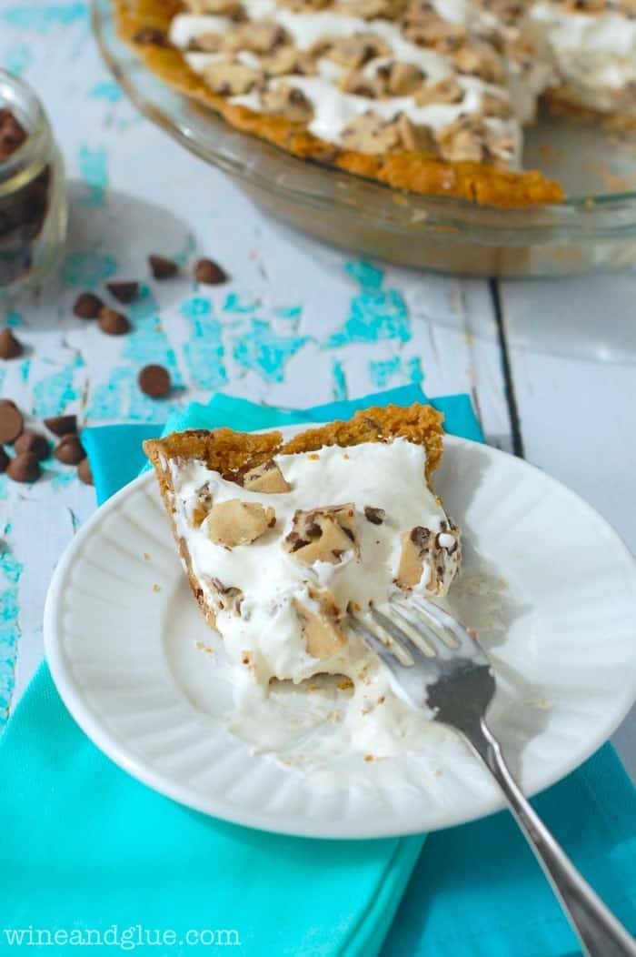 Cookie Dough Ice Cream Pie on a plate with some bites out of it