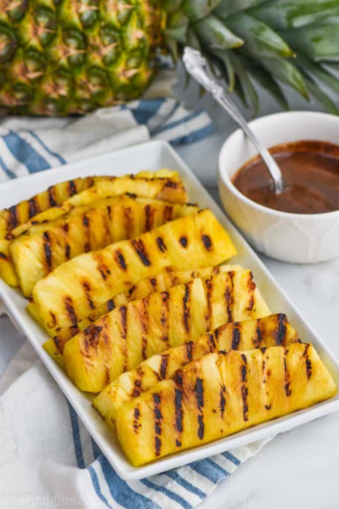 grilled pineapple spears on a platter