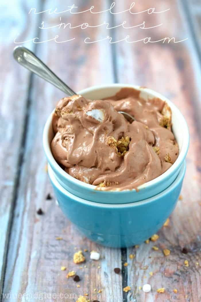 two bowls stacked with Nutella s'mores ice cream in it and a spoon