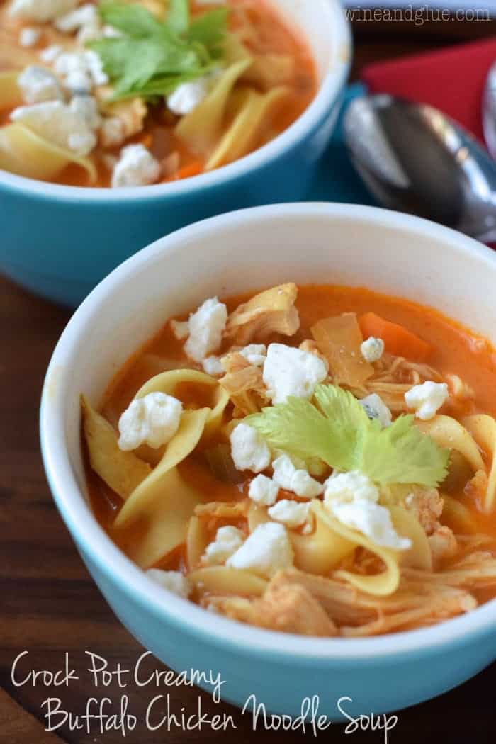 close up of a bowl of buffalo chicken soup, garnished with blue cheese