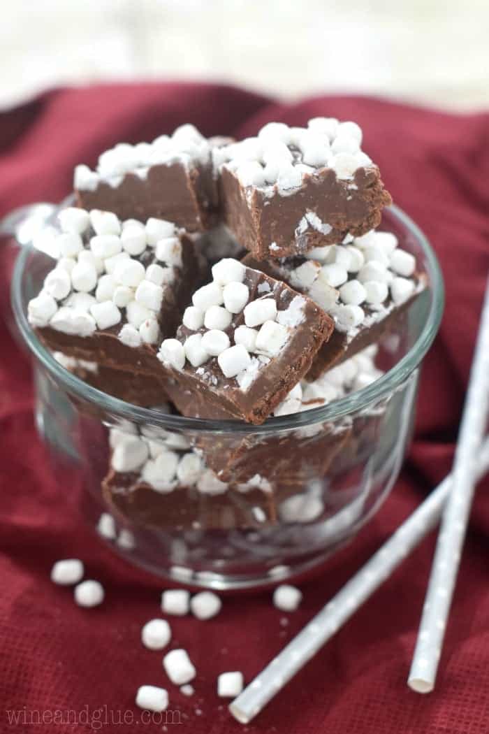 clear mug with hot cocoa fudge in it