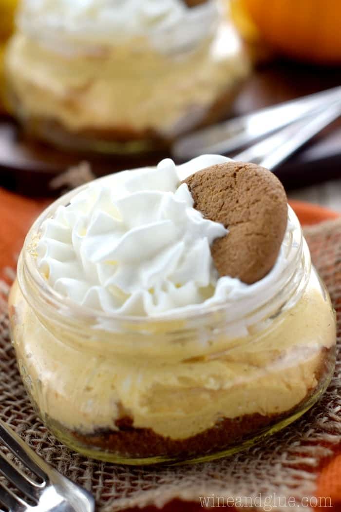 close up of a no bake cheesecake in a mason jar