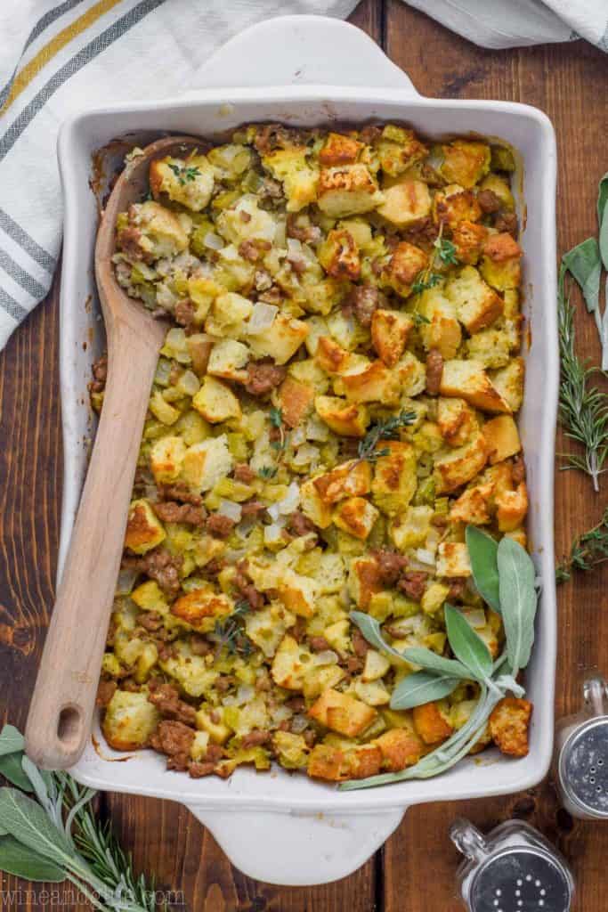 overhead view of sausage stuffing recipe in a 9 by 13 inch baking dish