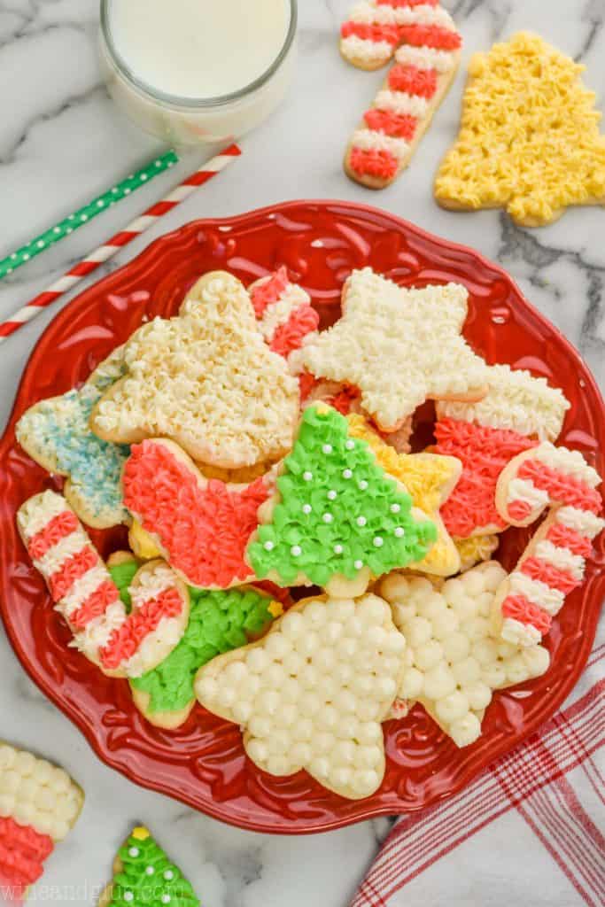 plate of frosted cut out sugar cookies