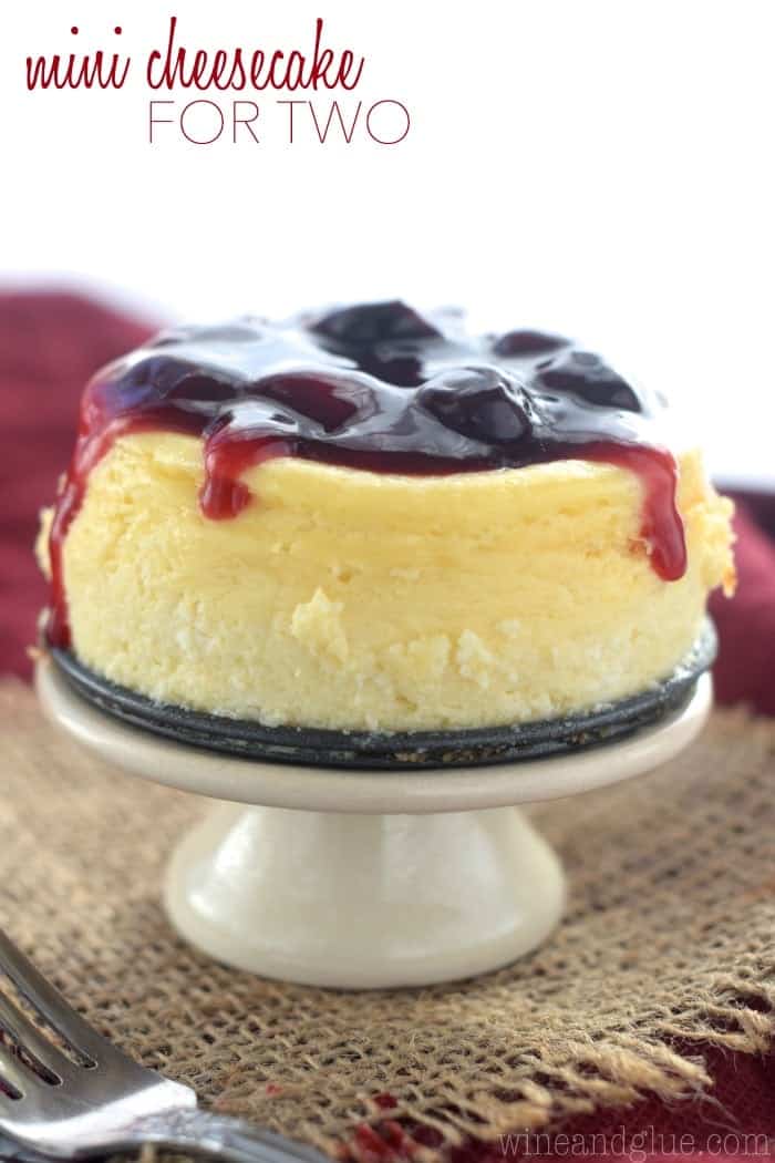 This cute little Mini Cheesecake is just perfect for you and your date! Delicious, creamy, and topped with homemade cherry sauce!