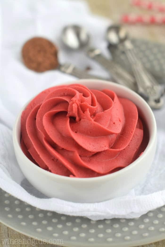 This Red Velvet Buttercream Frosting is rich, delicious, and perfect to top a cupcake . . . or spoon.