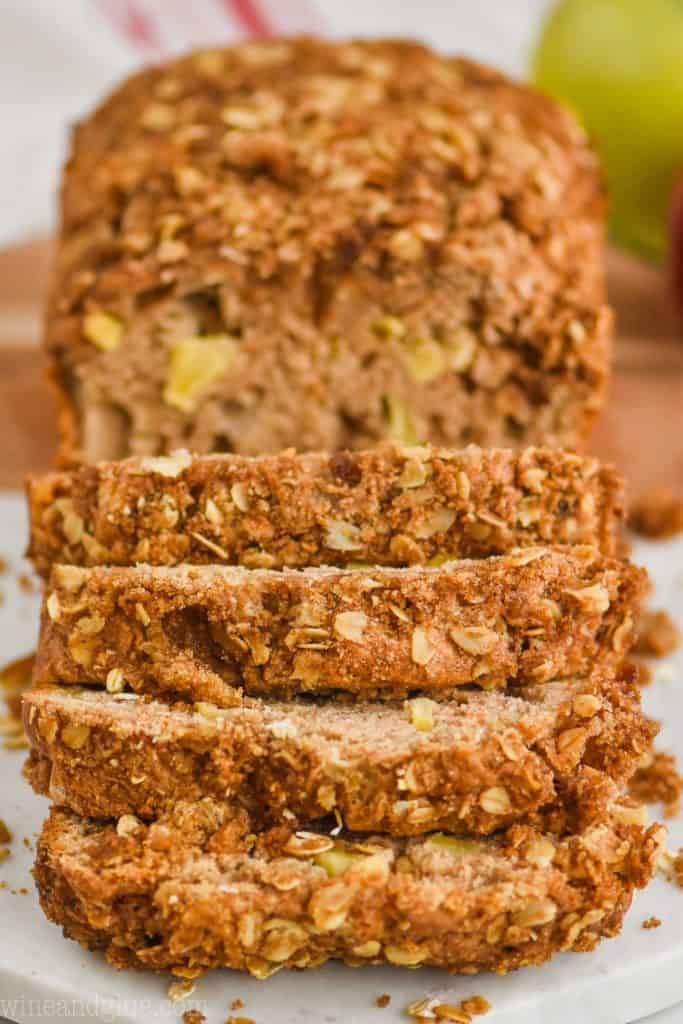 head on view of a loaf of apple fritter bread that has been sliced