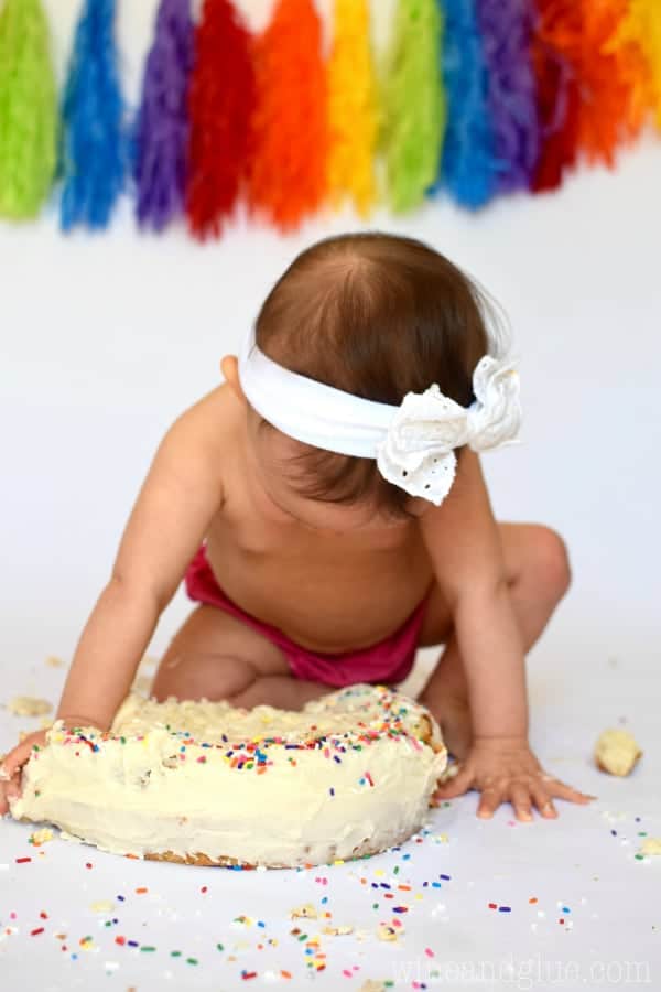 Take those cute pictures of your baby's first birthday and them eating their cake right at home with this DIY Cake Smash Photo Shoot!