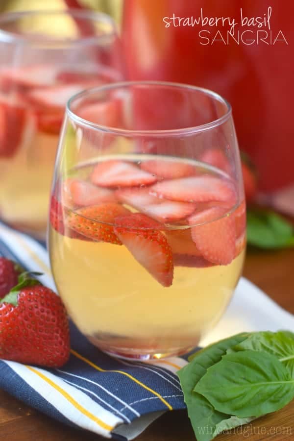 Such a perfect and easy summer cocktail! This Strawberry Basil Sangria is exactly what your summer BBQ or picnic needs!