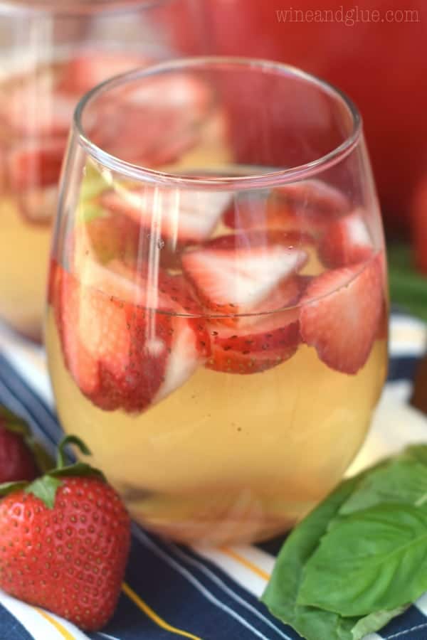 Such a perfect and easy summer cocktail! This Strawberry Basil Sangria is exactly what your summer BBQ or picnic needs!
