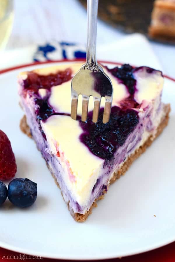 This Berry Swirl Cheesecake with waves of fresh strawberries and blueberries is so perfect for summer celebrations or anytime!