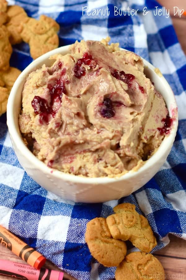 This Peanut Butter and Jelly Dip is a fun snack for the kiddos that whips up really fast and is a snack that you can feel good about.
