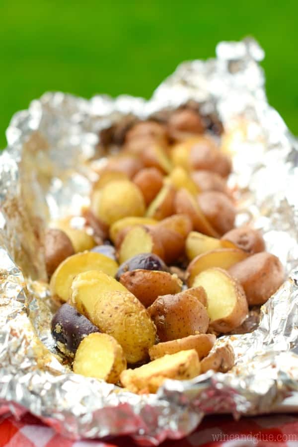 These Easy Grilled Parmesan Potatoes are so fast and the perfect side for a family BBQ!