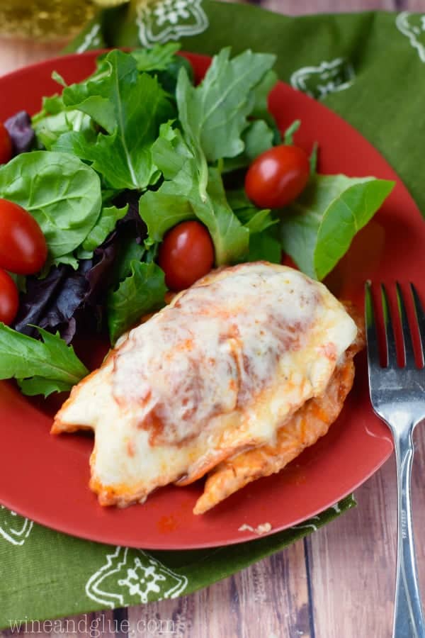 This Pizza Stuffed Chicken is such a fun twist on an ordinary baked chicken dinner and would be super easy to switch up with all of your favorite pizza toppings!