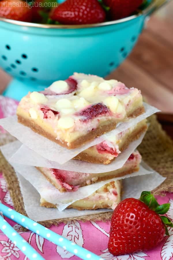 These Strawberries and Cream Magic Bars are pure magic. Made with fresh strawberries and a sugar cookie layer, they are seriously amazing!