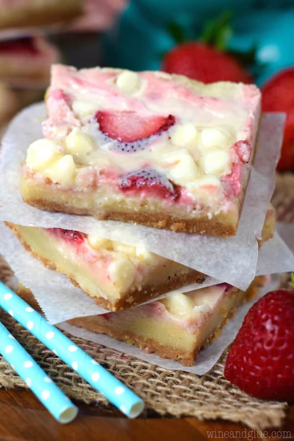 These Strawberries and Cream Magic Bars are pure magic. Made with fresh strawberries and a sugar cookie layer, they are seriously amazing!