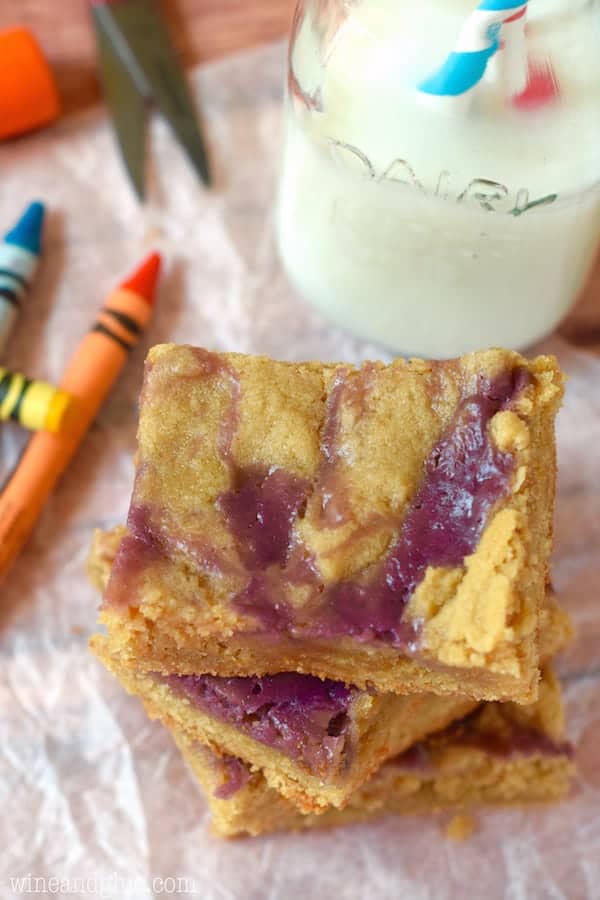 These Peanut Butter and Jelly Cookie Bars are a snap to make, but are SO GOOD the pan will disappear before you know it!