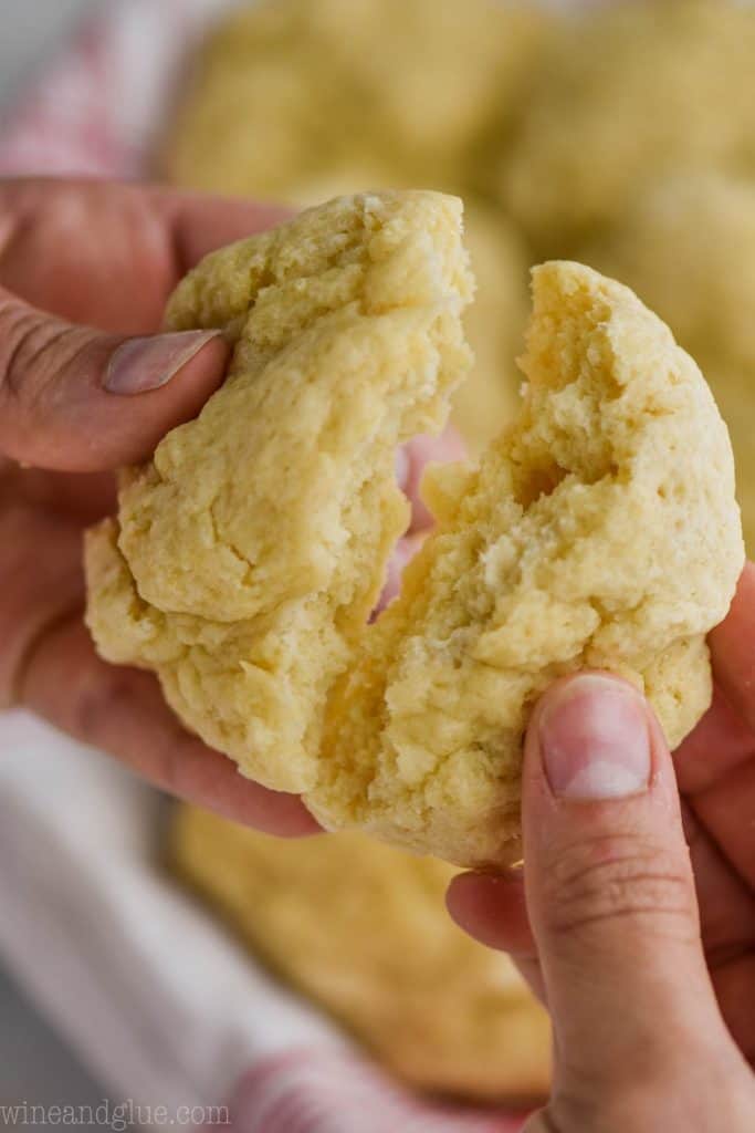 easy homemade biscuit being broken in half 