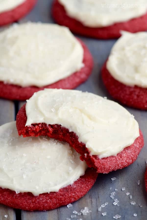 Red cookies with white frosting. 