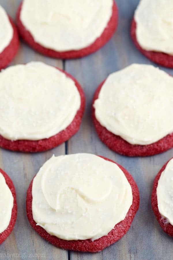 Red cookies with white frosting. 