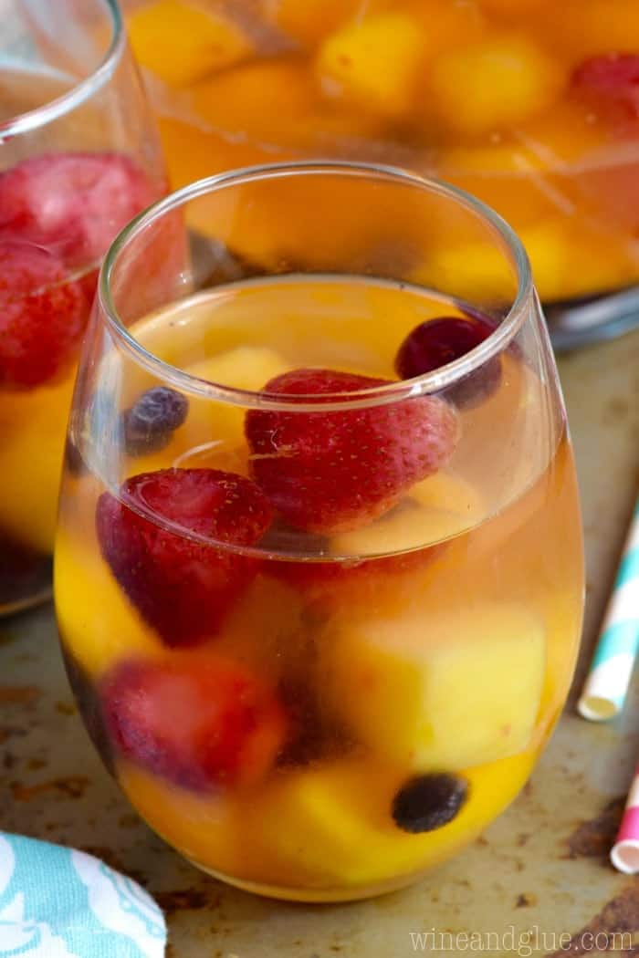 The Frozen Fruit Sangria has strawberries, mangos, cherries, and blueberries floating around the drink. 