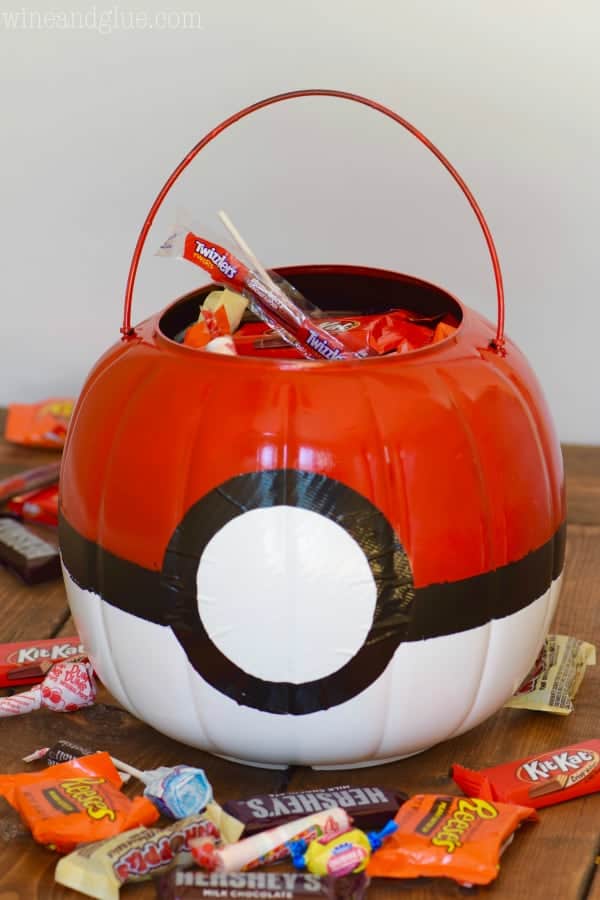 This Poké Ball Treat Bucket is such a super simple craft that will make your kiddo thrilled with their Pokémon Costume!