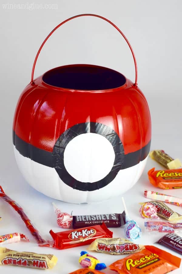 This Poké Ball Treat Bucket is such a super simple craft that will make your kiddo thrilled with their Pokémon Costume!