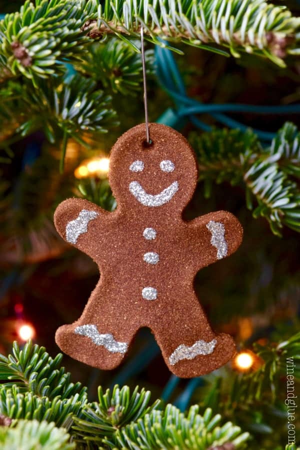 These Gingerbread Man Christmas Ornaments are such a fun easy holiday craft that smell just like gingerbread cookies! Perfect for a fun activity with the kiddos or gifting!