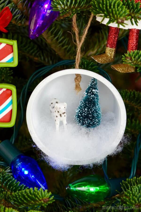 These Winter Wonderland Shadow Box Ornaments are so easy to make! A perfect addition to your tree or to gift!