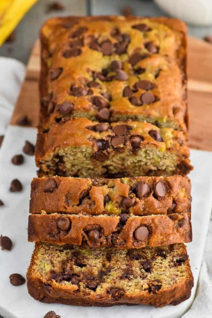 chocolate chip banana bread sliced on a cutting board