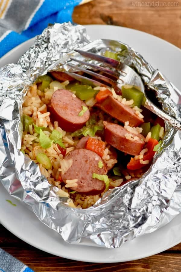 In a little foil packet, the Jambalaya has an array of green and red peppers, sausages, rice, lettuce, and many more. 