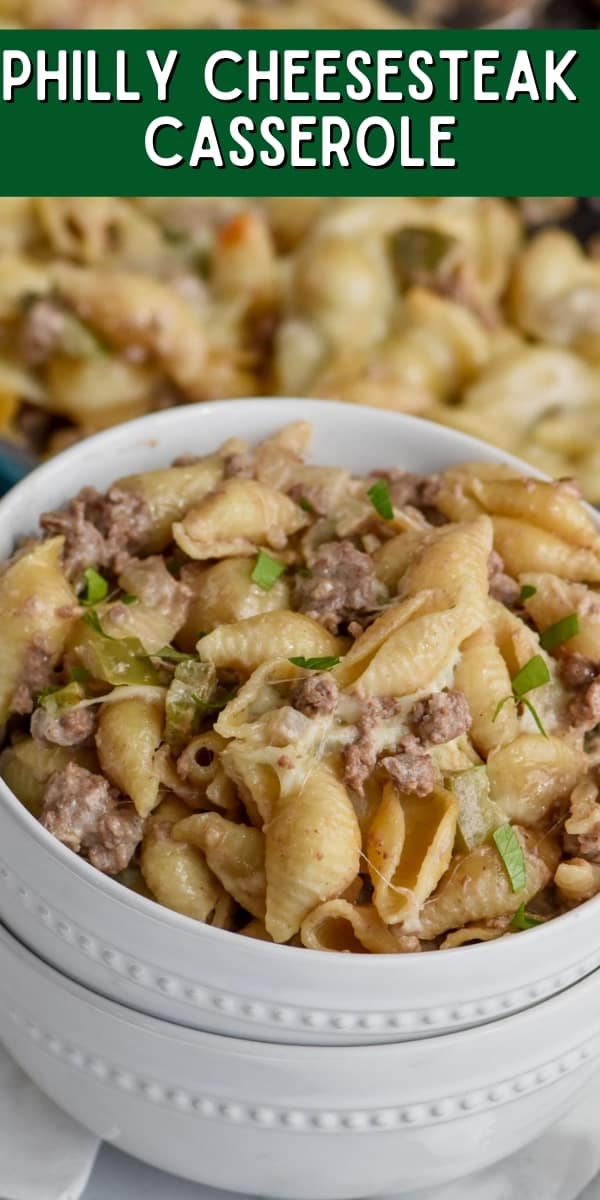 a white bowl full of Philly cheesesteak casserole