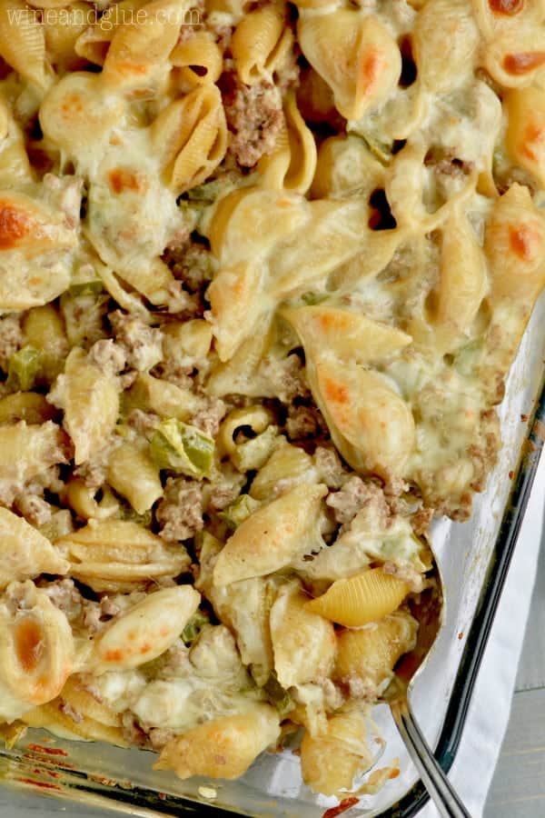 overhead view of a philly cheese steak casserole made with pasta shells, beef, and cheese