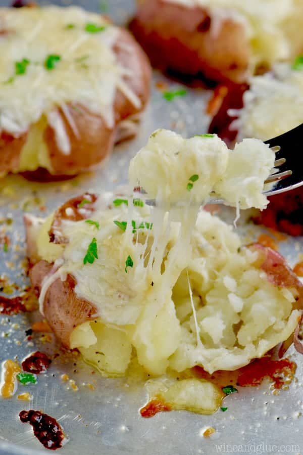 Italian Roasted Smashed potatoes that are loaded with goeey cheese!